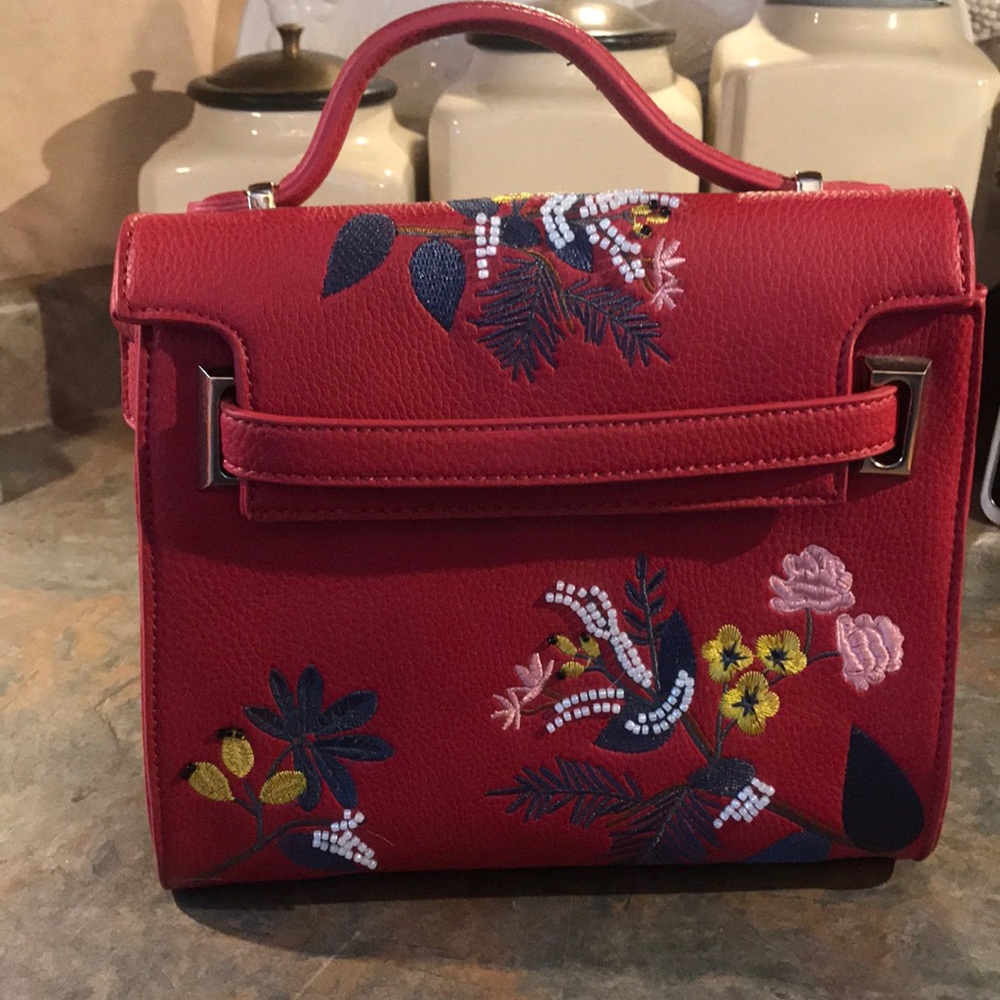 Super cute red faux leather purse with embroidery
